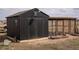 The backyard shows a nice outbuilding at 30484 Chisholm Trl, Elizabeth, CO 80107