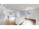 Spacious kitchen featuring a center island with granite counters and stainless steel appliances at 11718 Keough Dr, Northglenn, CO 80233