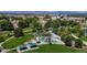 This aerial image shows a playground area with slides, climbing structures, and trees at 11718 Keough Dr, Northglenn, CO 80233