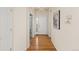 The entryway features hardwood floors, a chandelier, and an inviting transition into the home's living spaces at 2573 S Troy Ct, Aurora, CO 80014
