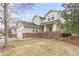 This house offers a well-maintained lawn and inviting curb appeal, perfect for a Gathering at 2573 S Troy Ct, Aurora, CO 80014