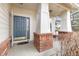 The front porch features stylish columns and a welcoming entryway, perfect for greeting guests at 2573 S Troy Ct, Aurora, CO 80014