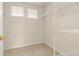 Walk-in closet with bright, adjustable shelving for maximum storage and organization options at 2573 S Troy Ct, Aurora, CO 80014