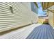 Backyard featuring a gray composite deck and a view of a wood fence at 1903 W 66Th Ave, Denver, CO 80221