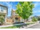 Charming two-story home featuring a welcoming front porch with beautiful curb appeal at 1903 W 66Th Ave, Denver, CO 80221