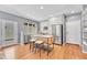 Updated kitchen featuring an island with seating, stainless steel appliances, and bright lighting at 1903 W 66Th Ave, Denver, CO 80221