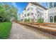 Scenic view highlighting the modern building with a path, complemented by green space at 1308 Snowberry Ln # 302, Louisville, CO 80027