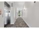 Hallway with an elevator and an exit, providing easy access and clear pathways at 1308 Snowberry Ln # 302, Louisville, CO 80027