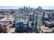Stunning aerial view of modern high-rise buildings with a cityscape backdrop at 1700 Bassett St # 1106, Denver, CO 80202
