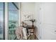 Cozy office nook with natural light, a world map, and a view of the city at 1700 Bassett St # 1106, Denver, CO 80202