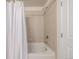 Clean, well-maintained shower featuring neutral tile, updated fixtures, and a functional design for everyday use at 1700 Bassett St # 1106, Denver, CO 80202