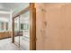Bathroom boasting double vanities, shower and mirrored closet doors at 9670 W 70Th Ave, Arvada, CO 80004