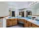 Bathroom featuring double vanities and large mirrors at 9670 W 70Th Ave, Arvada, CO 80004