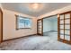 Cozy bedroom with natural light and attractive french doors at 9670 W 70Th Ave, Arvada, CO 80004