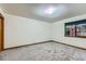 Cozy bedroom with a window featuring attractive wood trim at 9670 W 70Th Ave, Arvada, CO 80004