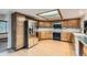 Spacious kitchen featuring wooden cabinets and stainless steel appliances at 9670 W 70Th Ave, Arvada, CO 80004