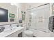 Bright bathroom with a combination shower and bathtub and artistic decor at 4150 Longview Ln, Boulder, CO 80301