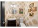 Half-bathroom with decorative wallpaper, modern fixtures, and a circular mirror at 4150 Longview Ln, Boulder, CO 80301