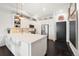 Bright kitchen with an island, stainless steel appliances, and dark hardwood floors at 4150 Longview Ln, Boulder, CO 80301
