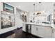 Open-concept kitchen with an island, stainless steel appliances, and hardwood floors at 4150 Longview Ln, Boulder, CO 80301