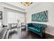 Bright living room featuring plush seating, modern artwork, and stylish curtains at 4150 Longview Ln, Boulder, CO 80301