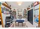 Office space filled with books and decor on shelves and white desk with the words 'BY APPOINTMENT ONLY' at 4150 Longview Ln, Boulder, CO 80301