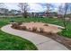 Charming community park featuring walking paths, mature trees, and a playground area for residents at 4150 Longview Ln, Boulder, CO 80301