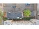 Aerial view of the property highlighting the roof, landscaping, and neighborhood surroundings at 1650 N Pennsylvania St, Denver, CO 80203