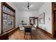 Bright dining room with a large window, hardwood floors, and modern decor at 1650 N Pennsylvania St, Denver, CO 80203