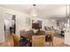 Charming dining area connected to the kitchen and living space, perfect for Gathering meals and gatherings at 374 Holly St, Denver, CO 80220