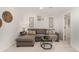 Basement living room showcasing neutral tones and cozy decor at 374 Holly St, Denver, CO 80220