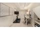 This home office features a desk and a work out area at 374 Holly St, Denver, CO 80220