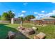 Backyard with fire pit, shed, and garden area at 6653 N Knox Ct, Denver, CO 80221