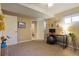 Basement bedroom with a workspace and large closet at 6653 N Knox Ct, Denver, CO 80221