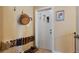 Entryway with shoe storage and a view to the home's interior at 6653 N Knox Ct, Denver, CO 80221