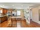 Modern kitchen featuring stainless steel appliances and wood cabinets at 6653 N Knox Ct, Denver, CO 80221