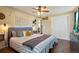 Spacious main bedroom with wood floors and ample closet space at 6653 N Knox Ct, Denver, CO 80221