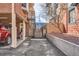 Private backyard with stairs leading to an upper level at 1355 Gaylord St # 10, Denver, CO 80206