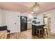 Charming kitchen with an island and a chandelier at 1355 Gaylord St # 10, Denver, CO 80206