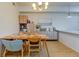 Dining area with modern light fixture, wooden table set at 1881 Mallard Dr # 1881, Superior, CO 80027