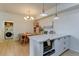 Open layout with island, dining area, and laundry room at 1881 Mallard Dr # 1881, Superior, CO 80027