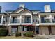 Charming condo exterior with brick accents, balcony, and private entrance, perfect for convenient living at 1881 Mallard Dr # 1881, Superior, CO 80027