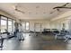 Well-equipped on-site gym with cardio machines, weights, and open space for yoga or stretching at 1881 Mallard Dr # 1881, Superior, CO 80027