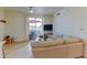 Bright living room with patio access, providing a cozy and inviting atmosphere with neutral decor at 1881 Mallard Dr # 1881, Superior, CO 80027