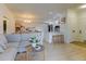 Bright, open-concept living area with modern finishes, seamlessly connecting to kitchen and dining space at 1881 Mallard Dr # 1881, Superior, CO 80027