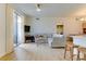 Cozy living room with ample natural light, perfect for relaxing and entertaining with modern ceiling fan at 1881 Mallard Dr # 1881, Superior, CO 80027