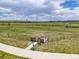 Dog Park in the community offers a fenced area with benches and a pet waste station for residents and their dogs at 11000 Shining Star Cir, Parker, CO 80134