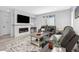 Inviting living room with a modern fireplace, cozy sofas, and elegant decor for comfortable living at 11000 Shining Star Cir, Parker, CO 80134