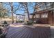 Beautiful backyard with outdoor movie screen, seating area, and stylish shed at 14707 E Wagon Trail Dr, Aurora, CO 80015