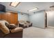 Finished basement with comfortable seating and ample space for recreation and relaxation at 14707 E Wagon Trail Dr, Aurora, CO 80015